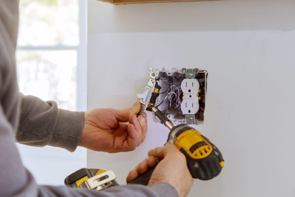 What is the correct way to install an electrical outlet?